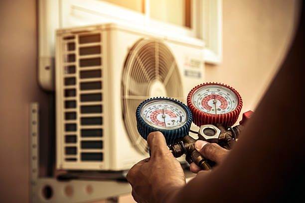 Professional Hvac Maintenance technician working in New Town, MA